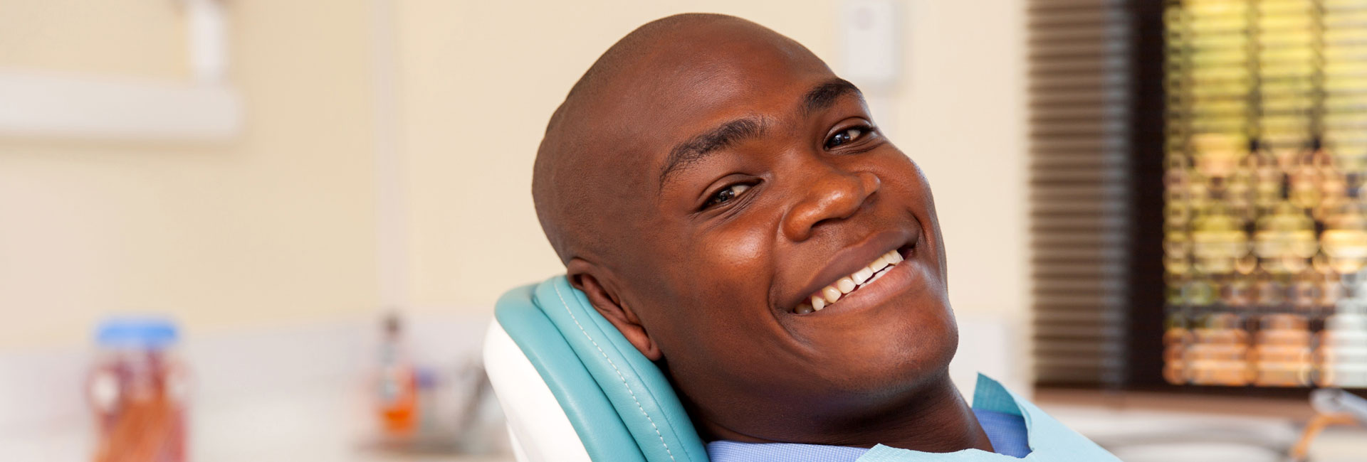 African man visiting dentist