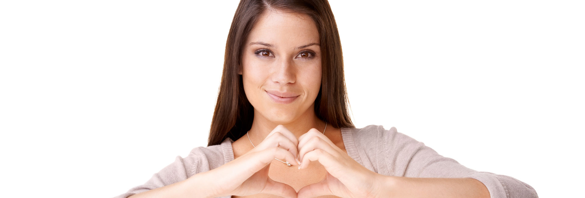 woman showing hearts symbol